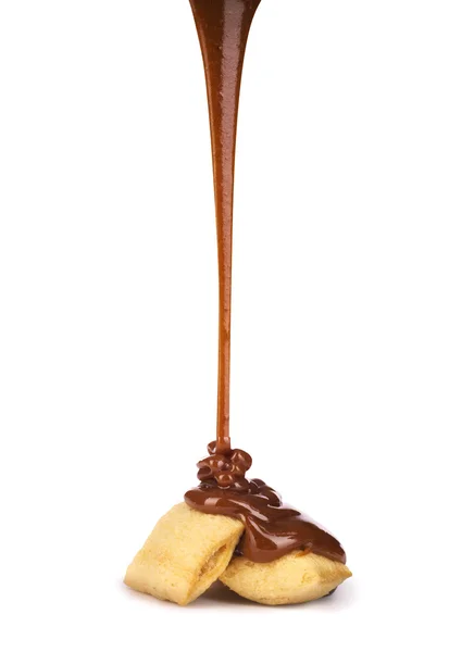 Chocolate derramando em travesseiros de cereais — Fotografia de Stock