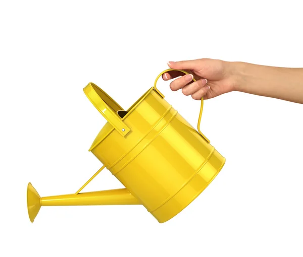 Concepto de jardinería. La mano de la mujer sostiene la lata de riego amarillo es — Foto de Stock