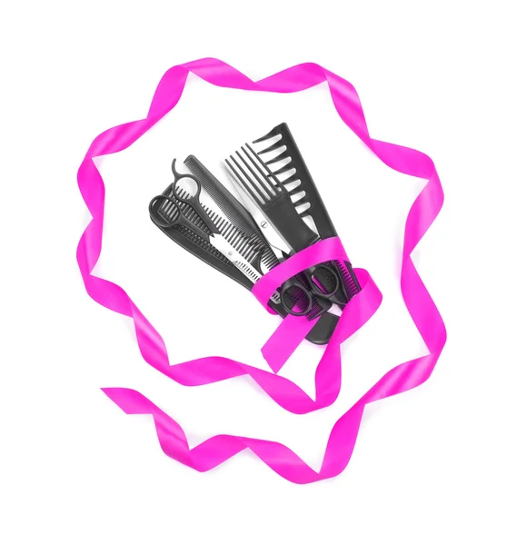 Friseur-Werkzeuge mit Geschenkband isoliert auf weiß — Stockfoto