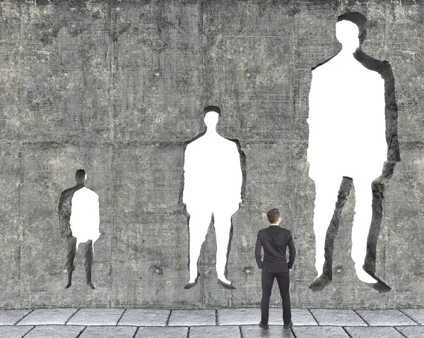 Чоловік Стоїть Перед Трьома Отворами Формі Людини Але Різних Розмірів — стокове фото