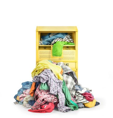 Donate box full of clothes isolated on a white background.