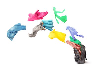 Clothes fly from backpack isolated on a white background. 3d illustration.