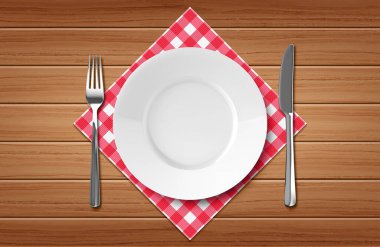 Empty plate or dish with knife and fork on wood  background clipart