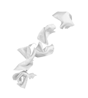 flying white pieces of fabric on a white background