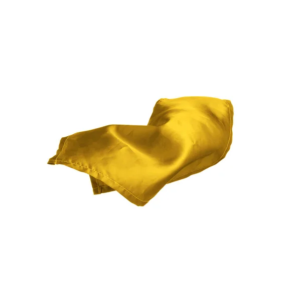 白い背景を飛行中の黄金の布 — ストック写真