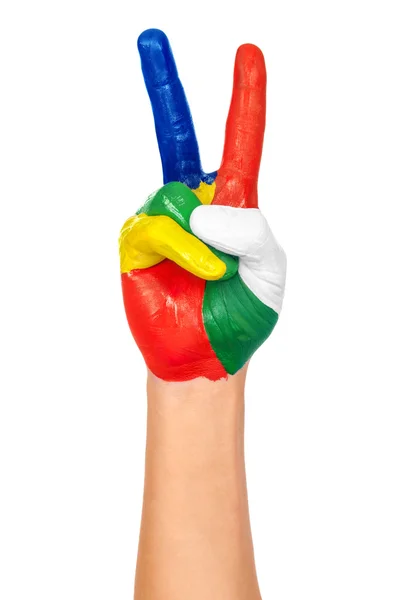 Painted hand showing peace gesture — Stock Photo, Image