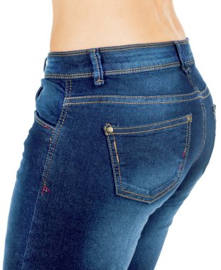 Kız beyaz bir arka plan üzerinde izole kot pantolon