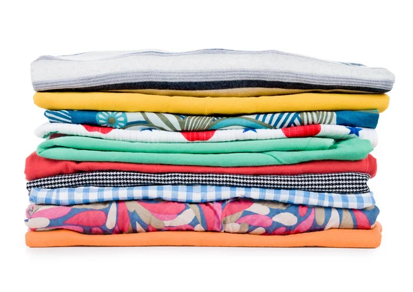 Pile of colorful clothes over white background — Stock Photo, Image