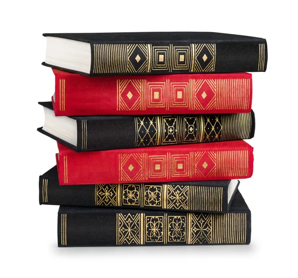 Stack of vintage books in a yellow cover on a white background — Stock Photo, Image
