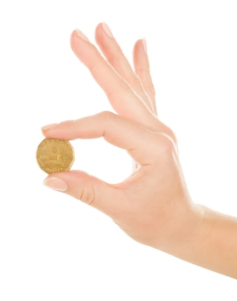 Mano de mujer con moneda aislada en blanco —  Fotos de Stock
