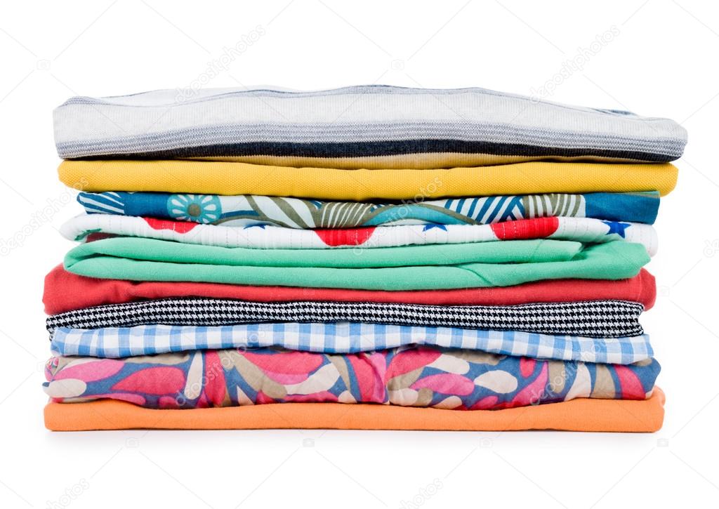 Pile of colorful clothes over white background