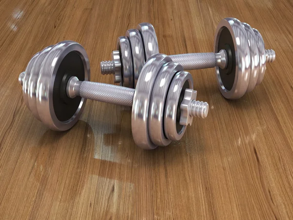 Big chrome dumbells over white background — Stock Photo, Image