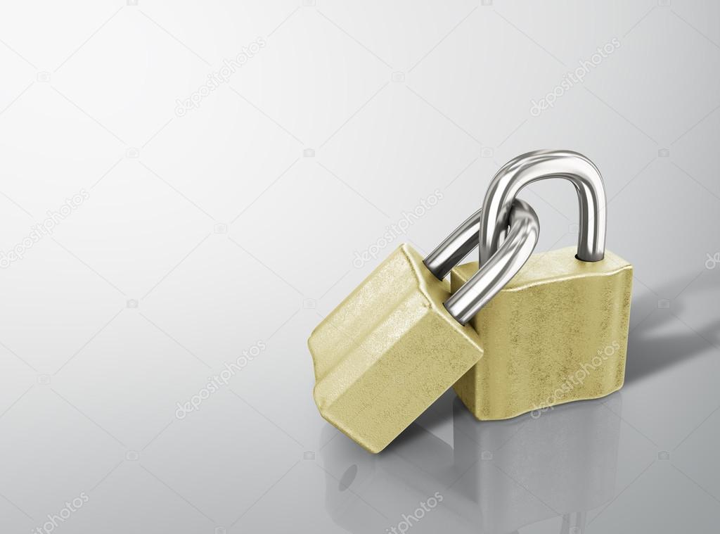 Two linked gold padlocks with reflections on a white background