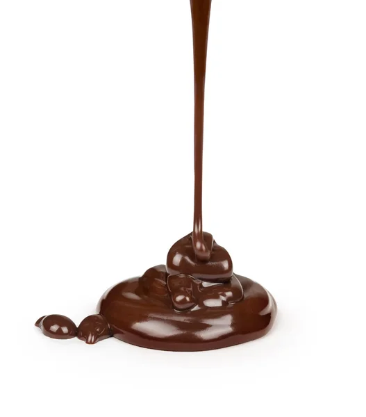 Coklat lezat dituangkan pada latar belakang putih — Stok Foto