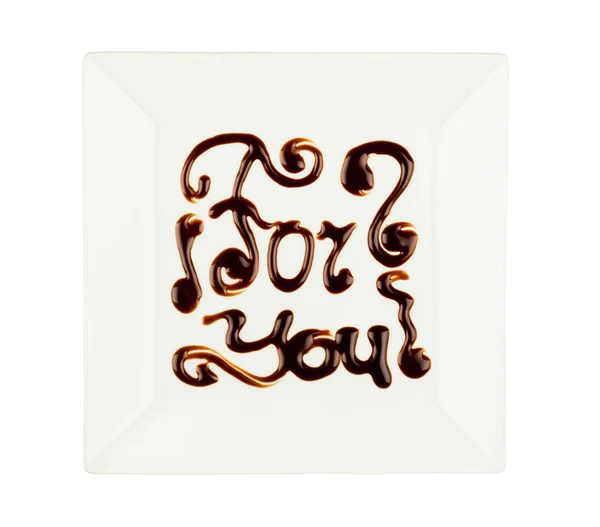 Drawing chocolate on a plate — Stock Photo, Image