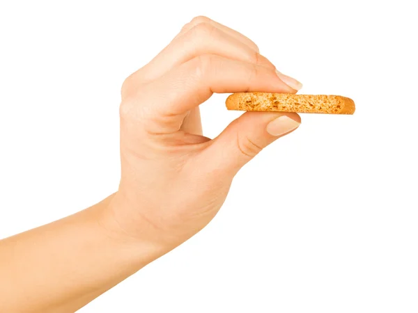 Овсяное печенье в руке на белом — стоковое фото