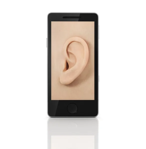 Oreille sur l'écran du téléphone. Écouter concept . — Photo