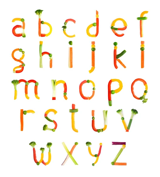 Alphabet created by vegetables on a white background — Stock Photo, Image