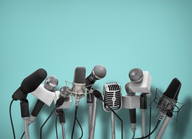Press conference with standing microphones. clipart