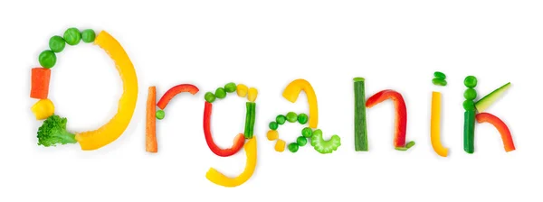 Η λέξη «οργανικά» από τα κομμάτια των λαχανικών σε άσπρο φόντο — Φωτογραφία Αρχείου