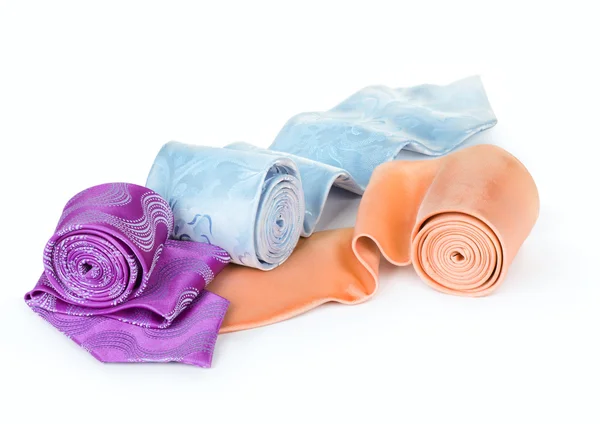 Multicolored ties on a white background — Stock Photo, Image