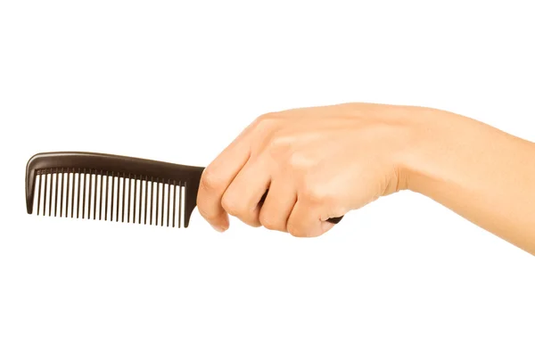 Escova de cabelo na mão isolada em branco — Fotografia de Stock