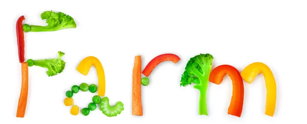 Inscription farm from pieces of vegetables on white background — Stock Photo, Image