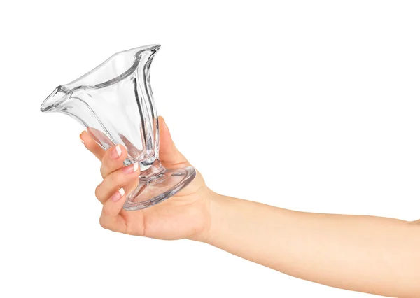 Hand met een leeg glas piala op een afgelegen witte achtergrond — Stockfoto