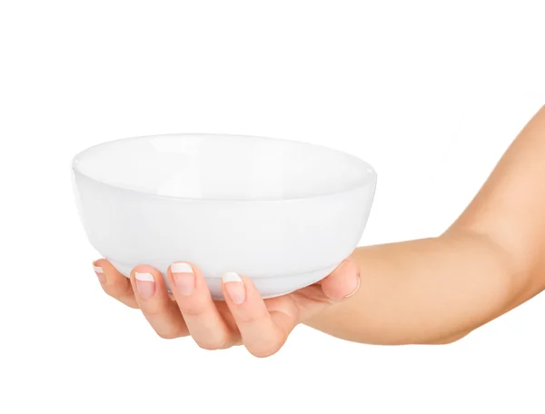 Hand holding an empty bowl on a white background — Stock Photo, Image