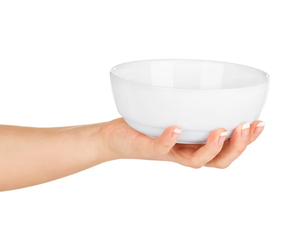 Hand holding an empty bowl on a white background — Stock Photo, Image