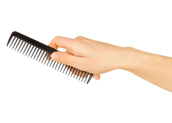 Escova de cabelo na mão isolada em branco — Fotografia de Stock