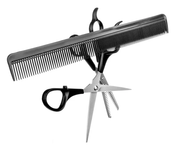 Pilník a nůžky na bílém pozadí — Stock fotografie