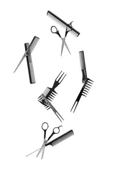 Chute des outils de coiffure sur fond blanc — Photo