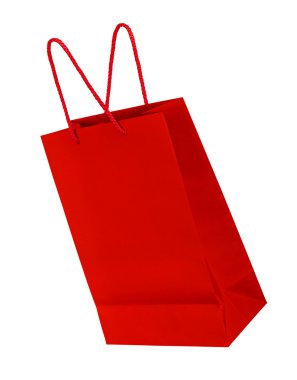 havada bir izole w üzerinde düşen parlak kırmızı alışveriş çantası