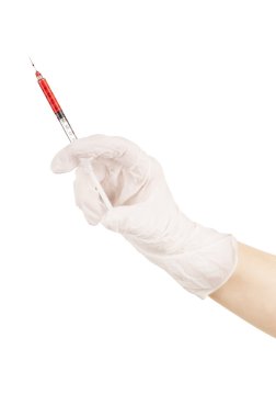 bir doktor bir şırınga ile el