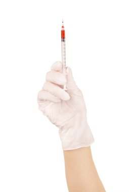 bir doktor bir şırınga ile el