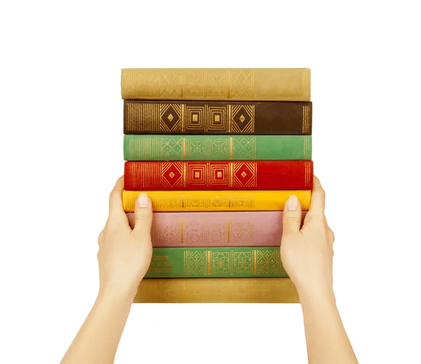 Books in hands isolated on a white — Stock Photo, Image