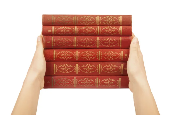 Books in hands isolated on a white — Stock Photo, Image