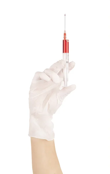 Mão de um médico com uma seringa — Fotografia de Stock