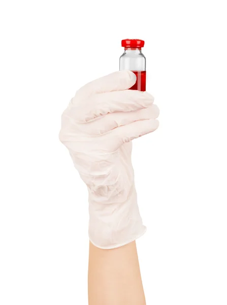 Medicinska ampull i en hand på en vit bakgrund — Stockfoto