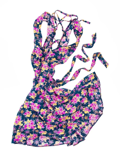 Vestido de verano en movimiento estampado floral en el aire en un aislado — Foto de Stock
