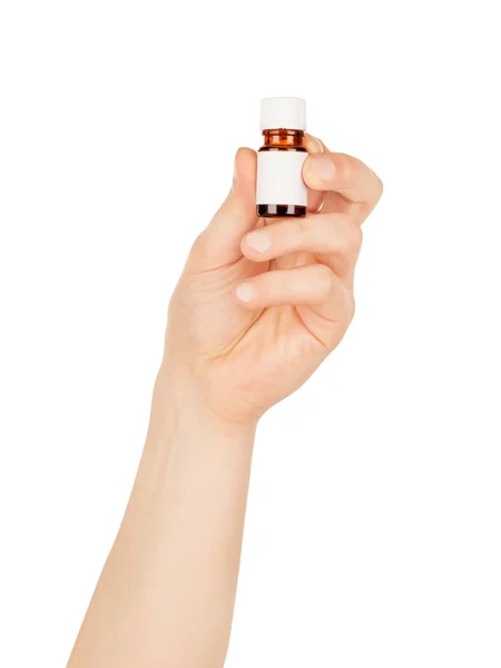 Man hand met kleine fles geïsoleerd op witte achtergrond — Stockfoto