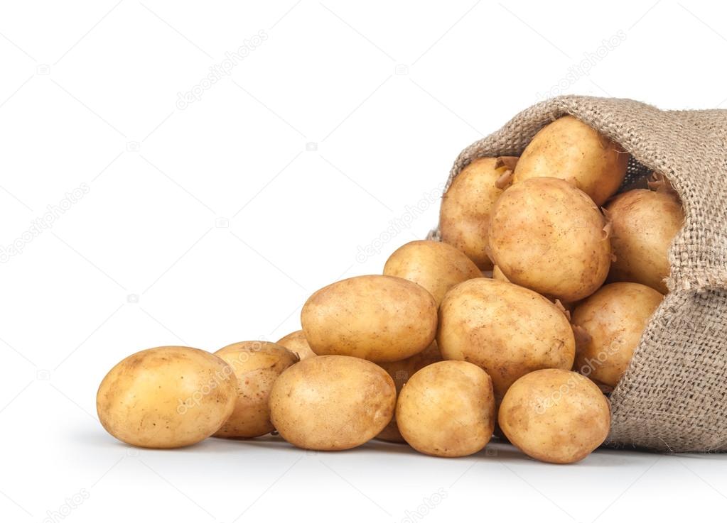 new potatoes in the bag isolated on white background. close-up.