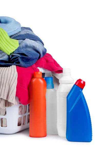 Clothes with detergent and in  plastic basket dropped isolated o — Stock Photo, Image