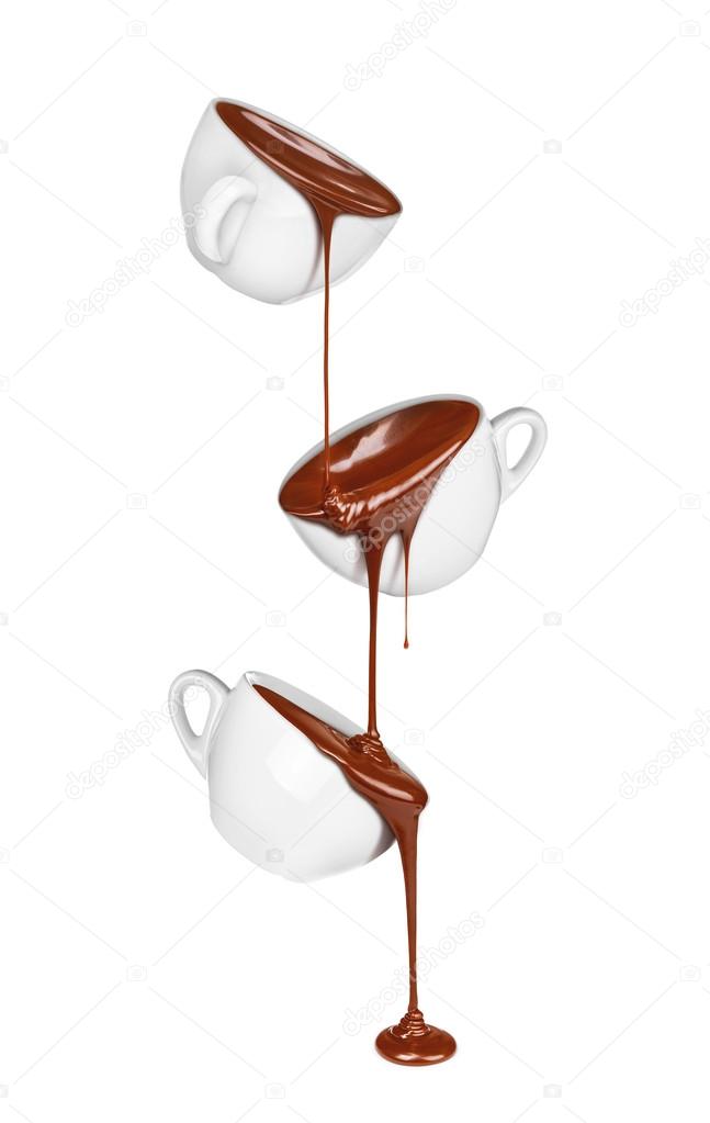 hot chocolate pouring from a cup in a cup isolated on a white ba