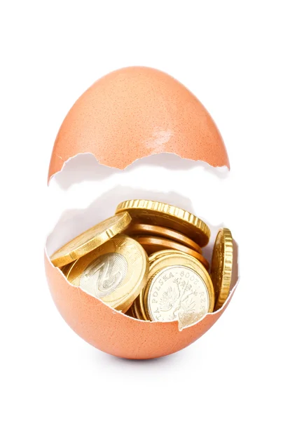 One cracked hen's egg and coins isolated on white — Stock Photo, Image