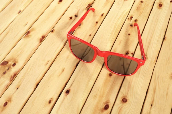 Sunglasses on vintage wood.Summer holiday background concept. — Stock Photo, Image