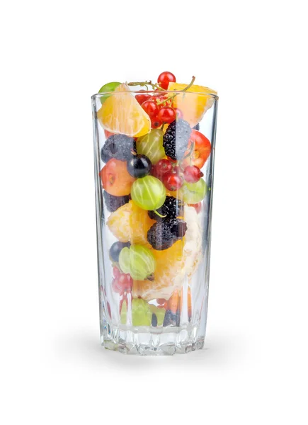 Fruit salad in a glass isolated on white — Stock fotografie