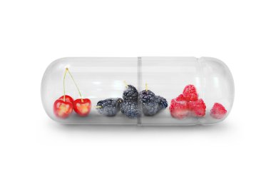 Beyaz izole çilek ile tıbbi kapsül