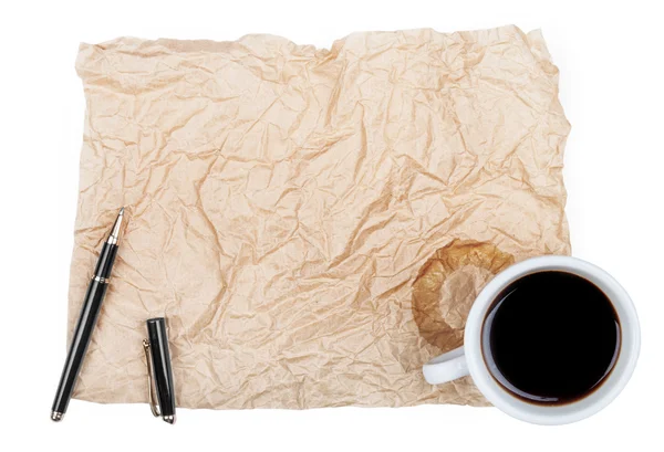 Papel blanco en blanco con bolígrafo y media taza de café vacía , — Foto de Stock